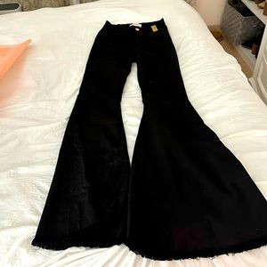 COPY - Ripped black flare jeans with rose gold button